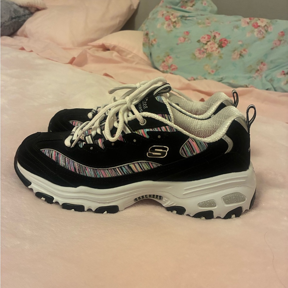 Skechers D’lites “Interlude”Black and White with rainbow detail and glitter.